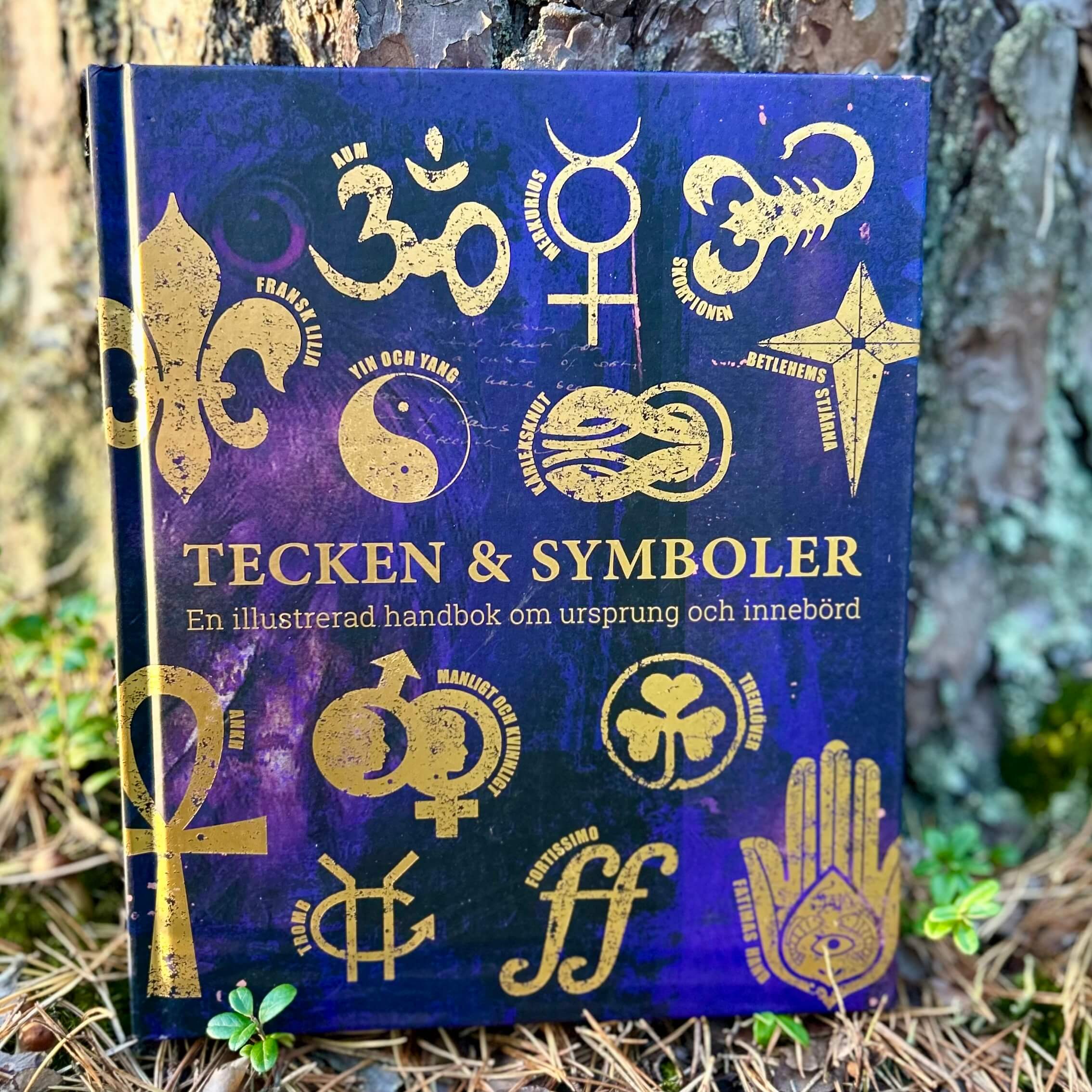 Tecken & symboler : en illustrerad handbok om ursprung och innebörd
